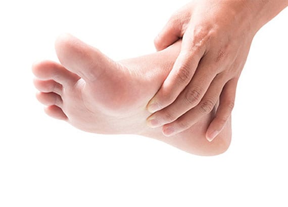 Inner foot pain above the arch due to accessory navicular syndrome.