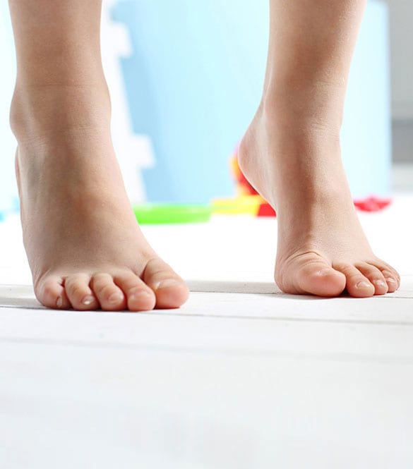 Feet of an adolescent child.