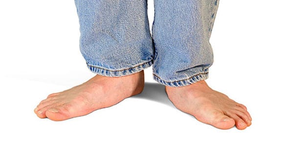 Male with a pair of flat feet.