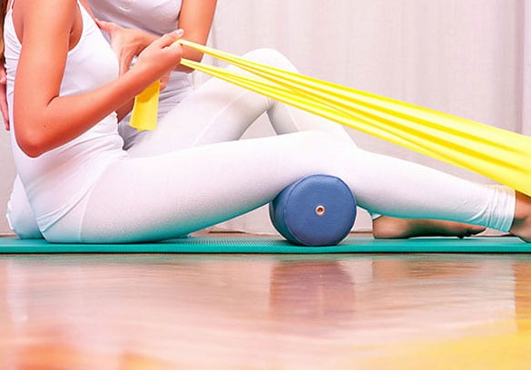 Woman receiving physical therapy for tarsal coalition of the foot.